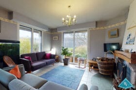 Maison avec garage et jardin