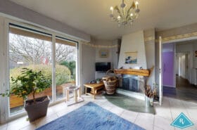 Maison avec garage et jardin