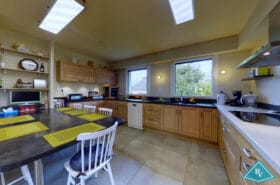 Maison avec garage et jardin