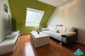 Maison de plain-pied avec garage et jardin