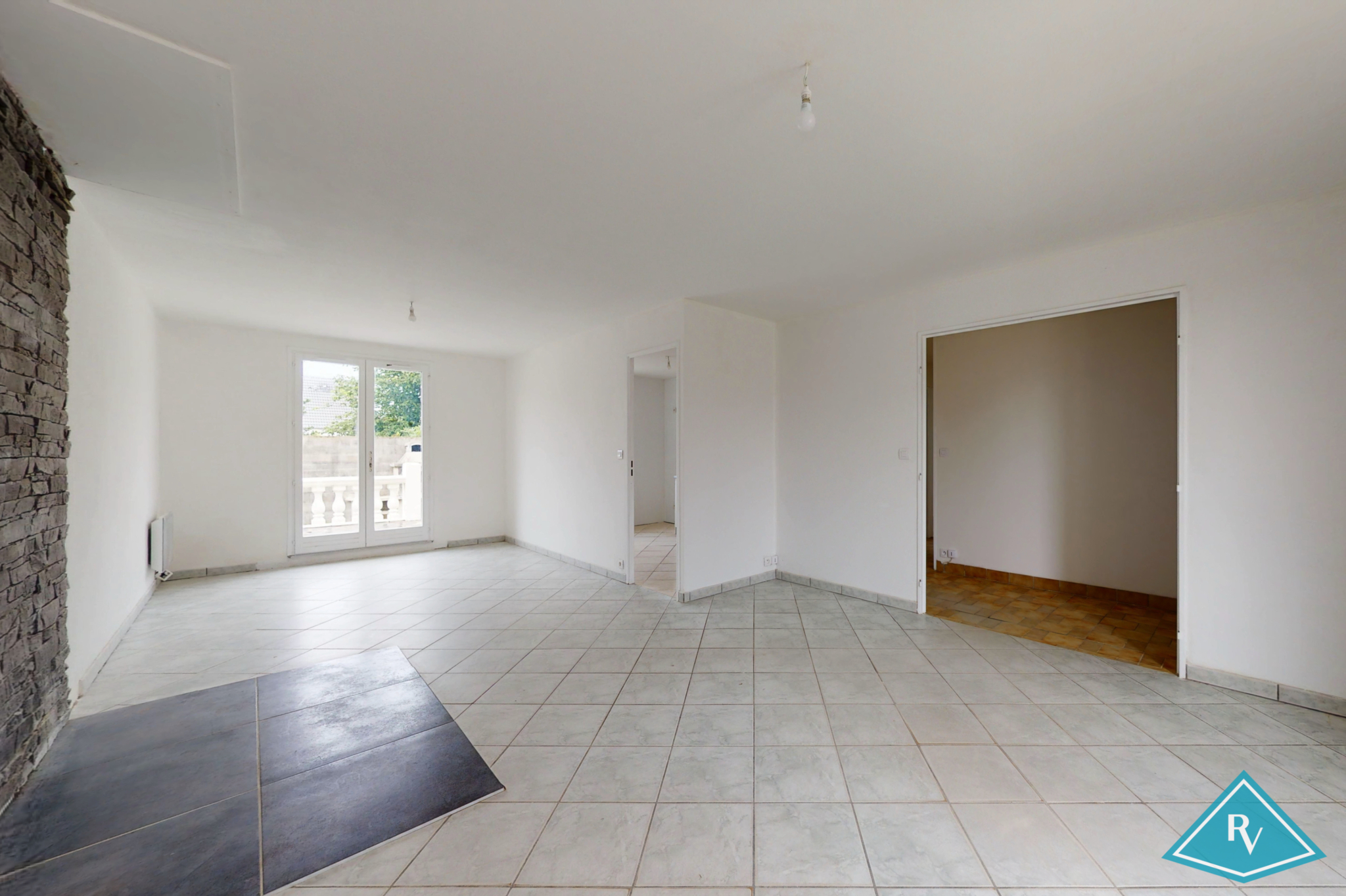 Maison de plain pied avec jardin et garage