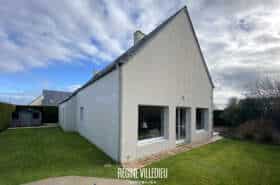 Maison avec garage et jardin