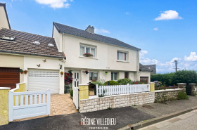 Maison avec garage et jardin