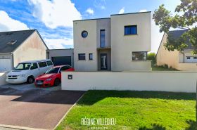 Maison contemporaine avec jardin et garage