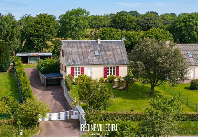 Maison à la campagne avec jardin et garage