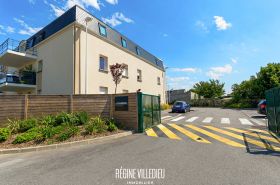 Appartement en résidence avec balcon et parking