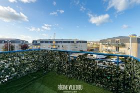 Appartement en résidence avec balcon et parking
