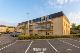 Appartement en résidence avec balcon et parking