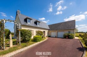 Maison familiale avec jardin et double garage