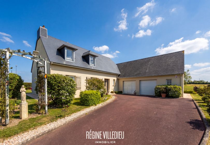 Maison familiale avec jardin et double garage