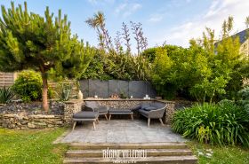 Maison avec garage et jardin