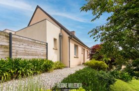 Maison avec garage et jardin