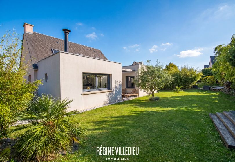 Maison avec garage et jardin