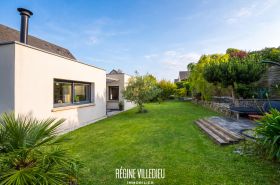 Maison avec garage et jardin