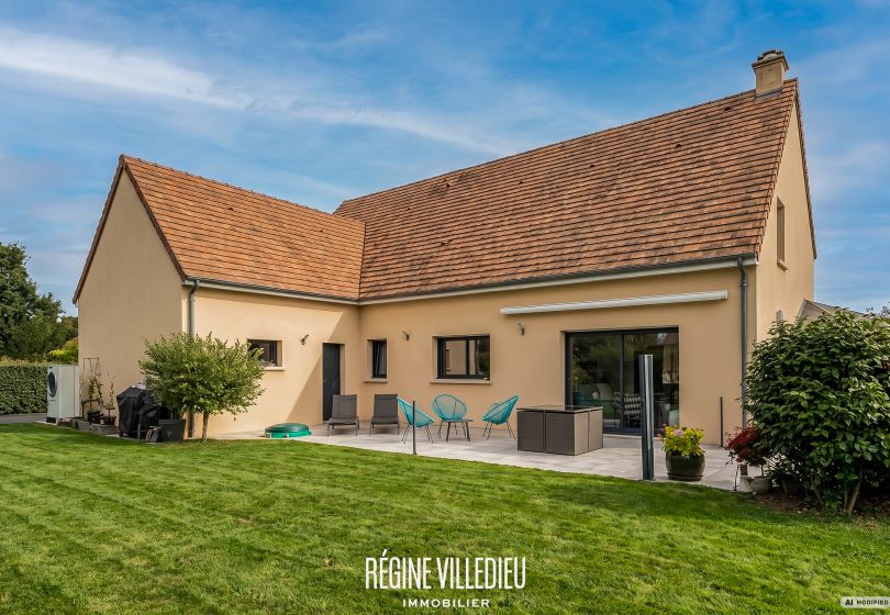 Maison récente avec grand jardin et garage